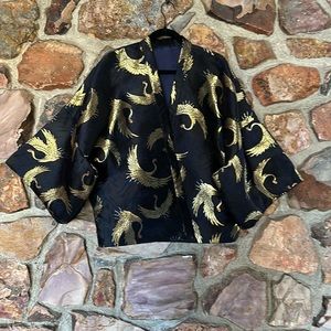 Black satin, crop kimono, with gold stork pattern detail.
